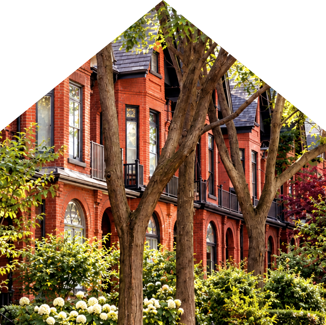 Row of red-brick Toronto homes on a leafy street